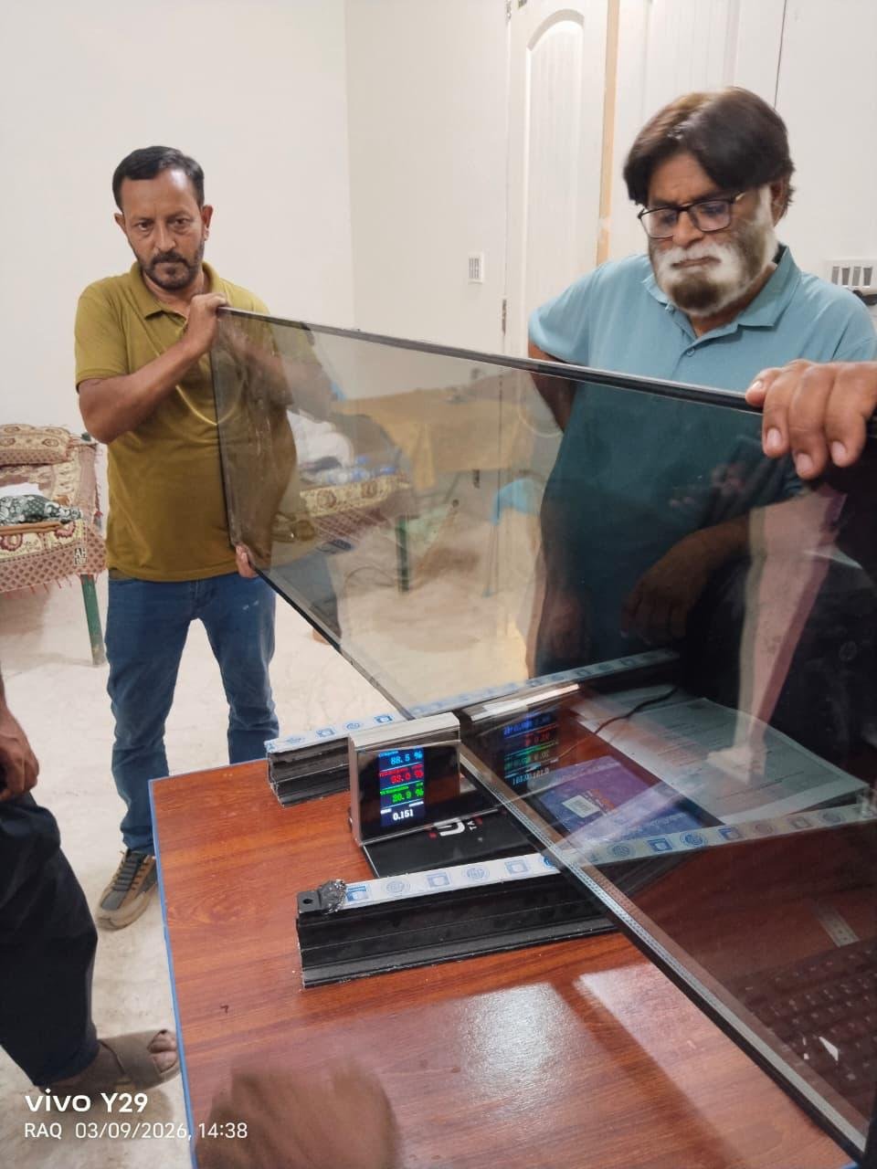 NGC team checks glazing performance during the Low-E glass inspection at Lalian.