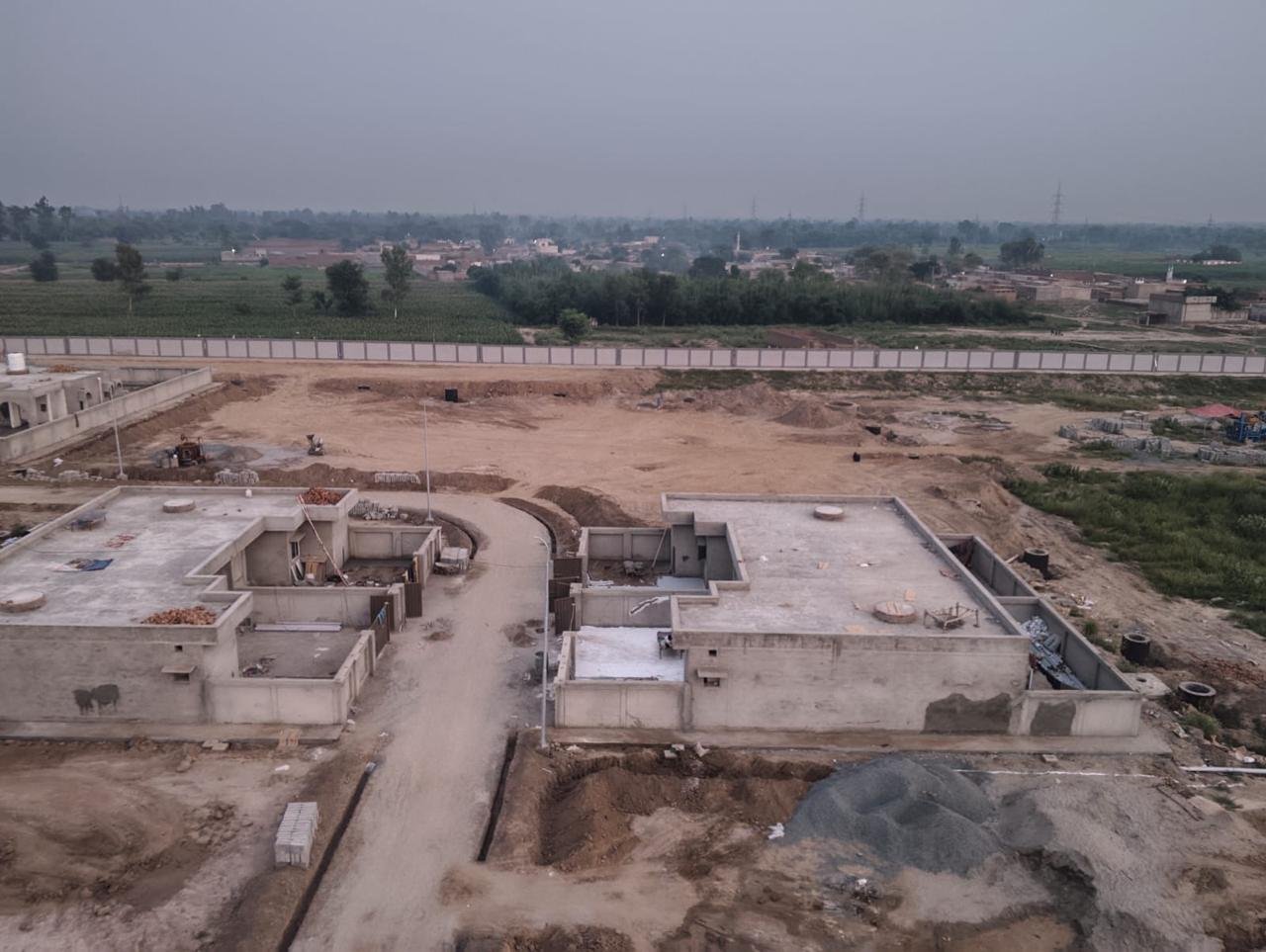 Bird’s-eye view of housing units and site infrastructure.